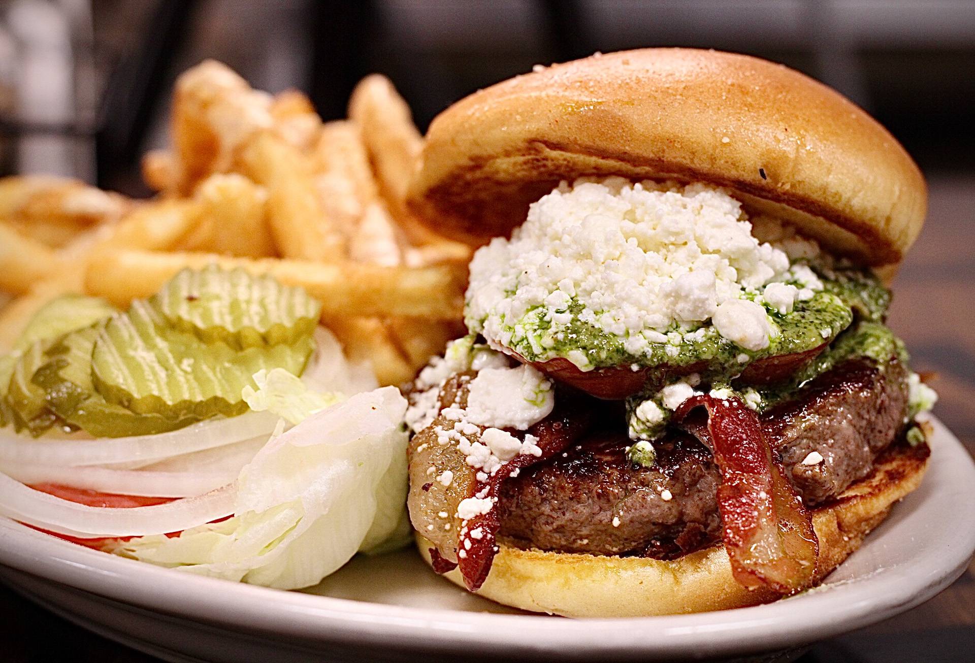 Handcrafted gourmet burgers with a variety of toppings served at Brooks Burgers in Naples, Florida.