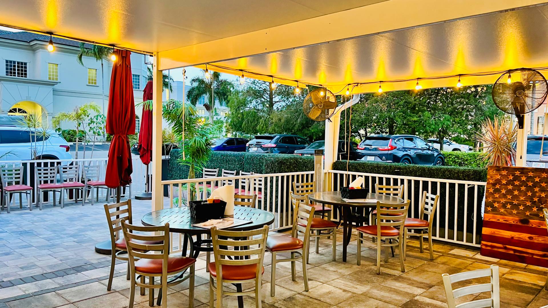A juicy handcrafted burger with a side of crispy French fries at Brooks Burgers in Naples, Florida.